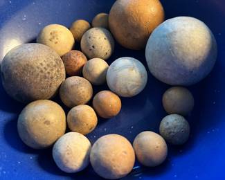 Collection of antique marbles made out of stone or wood