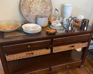 side buffet table or sofa table. Lots of storage with drawers and baskets. Tile inset on top - great for serving!