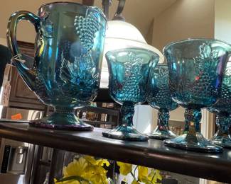Carnival glass pitcher and glassware. Just love how it catches the light!