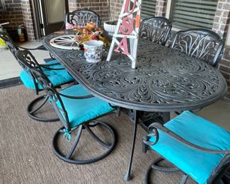 Patio furniture - cast aluminum. Nice heavy piece, includes 6 chairs and pads.