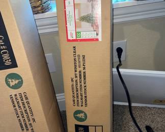 3 small trees in boxes plus there is a set of 3 primitive trees!