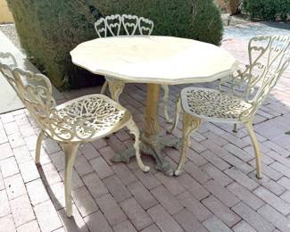 Wrought iron patio chairs + table