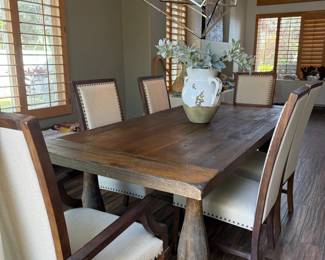Loving this rustyic coffee table with chairs to match