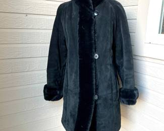 Lot #174 - Women's Sleek Black Genuine Suede Leather Mid-Length Coat and Faux Fur Lining by Gallery (M)