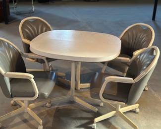 Chromcraft dining set with 4 swivel -tilt caster chairs 
