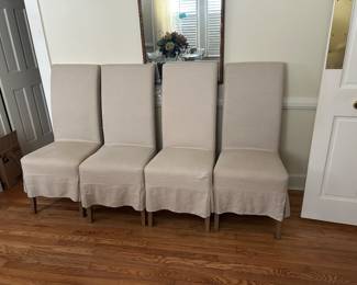 Four linen dining chairs in very nice condition.