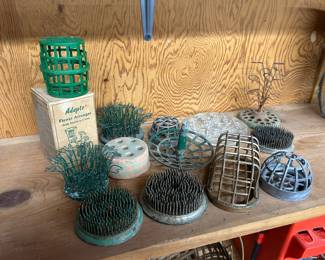 Vintage and current floral frogs.