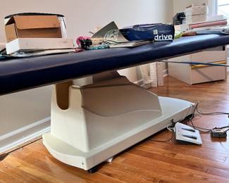 Adjustable treatment table