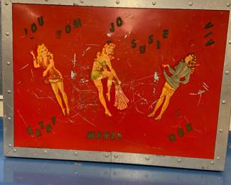 One side of case with vintage decals