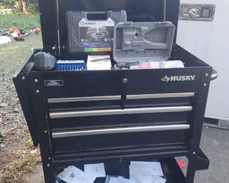 Lot 307:Husky ball bearing two drawer flip top large toolbox with pegboard sides on casters... Comes with all tools shown