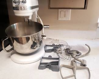 Lot 208:White KitchenAid mixer with attachments and stainless steel mixing bowl. Model WA2391948
