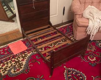 Antique child’s toddler bed