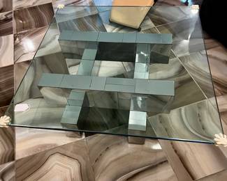 SPECTACULAR GLASS TOP COFFEE TABLE WITH METAL BASE...CHILD PROOF CORNERS CAN EASILY BE REMOVED