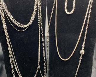 Four Silver Toned Necklaces