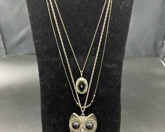 Silver and black necklaces