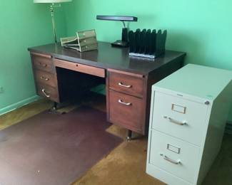Desk and metal file cabinet