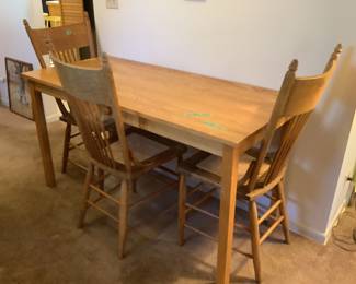 Oak table/ desk….has one drawer.  55 l x 25” w x 30” h.  Three oak caned chairs.  $45 each or three of $125.