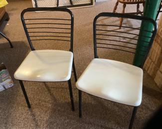 Set of six vintage metal folding chairs.