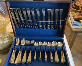 Twelve placesettings of flatware and box