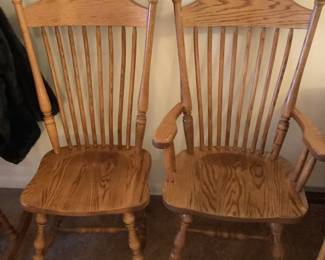 Set of four Amish oak chairs.  One arm and three side.  Presale $295