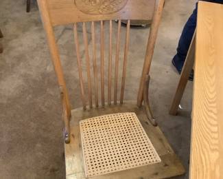 Oak caned chair….three available.   $45 each or three for $125