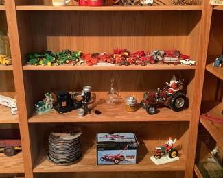 Smaller tractors by Ertle toy company, plates, 