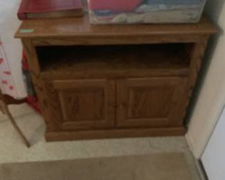 Flat screen tv stand with open area for sound systems