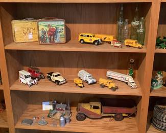 Vintage lunchboxes with thermos, Roy Roger’s and Atonto, vintage toy trucks