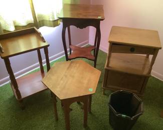 Four smaller wood end tables or plant stands