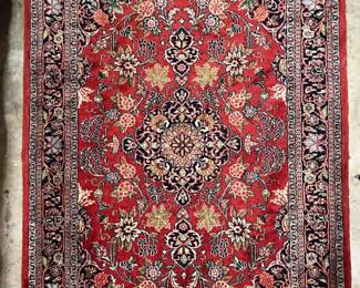 Handknotted wool area rug