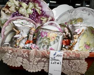 Basket of vintage porcelain figurines, plates, glassware, and more