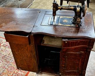Antique White sewing machine with cabinet