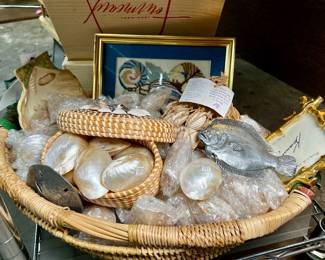 Basket of seashells, seashell and beach themed items
