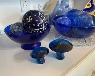 love these tiny little glass mushrooms, blue glass