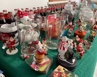 huge collection of coca-cola including commemorative six packs, pitchers, glasses, music boxes, etc