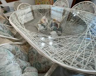 Stunning spun fiberglass dining table seats six, with six arm chairs -- comfortable and long lasting (center of table features beautiful shells)