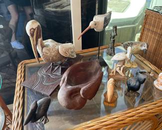 various birds -- wooden, ceramic, metal