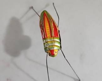 Vintage tin grasshopper