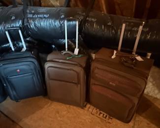 Set of Three Swiss Gear Rolling Suitcases