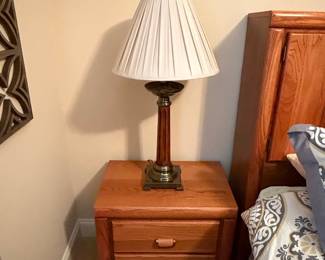 Traditional Oak Nightstand with Brass Lamp