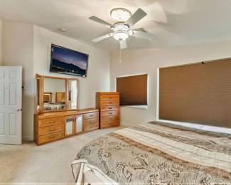 Matching wood dresser and drawers with mirror, large television