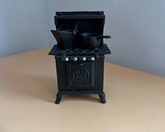 D161 - $15. Bluebird Salesman Sample Cast Iron Stove with accessories. 