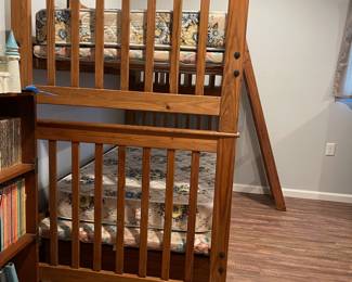 D76 - $150. Wooden Bunk Bed with Ladder & Drawer. Includes 2 regular twin mattresses but it is long enough to fit twin XL. Can be used as individual beds as well if you don't want them stacked. Measures 83" x 43" x 65" tall.  Located in a walk out basement but you will need 2 people to disassemble and move out!