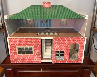 D58 - $20. Homemade Dollhouse crafted from wood / foamboard type material. Closed it measures 24" wide x 13" deep x 19" tall. 