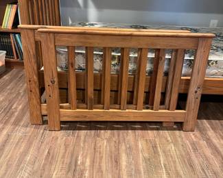 D76 - $150. Wooden Bunk Bed with Ladder & Drawer. Includes 2 regular twin mattresses but it is long enough to fit twin XL. Can be used as individual beds as well if you don't want them stacked. Measures 83" x 43" x 65" tall.  Located in a walk out basement but you will need 2 people to disassemble and move out!