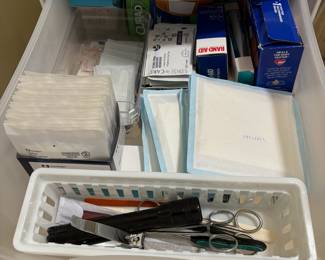 D126 - $30 - 3 Drawer cart of bandages / first aid supplies. 