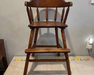 D72 - $20. Childs Wooden Highchair. Measures 19" wide x 19" deep x 30" tall. 