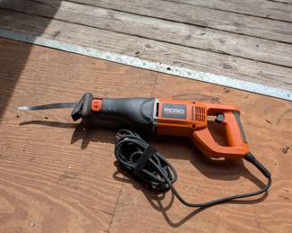 D173 - $40. Ridgid Saw. 