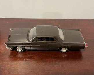 D96 - $80. 1963 Pontiac Bonneville Dealer Promo Car. One wheel is not attached but we have it. 