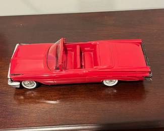 D92 - $50. 1959 Pontiac Bonneville 2 Door Convertible. Dealer Promo Car 1:25 scale. Sun visor is bent and there is a lot of wear on the Chrome accents.  